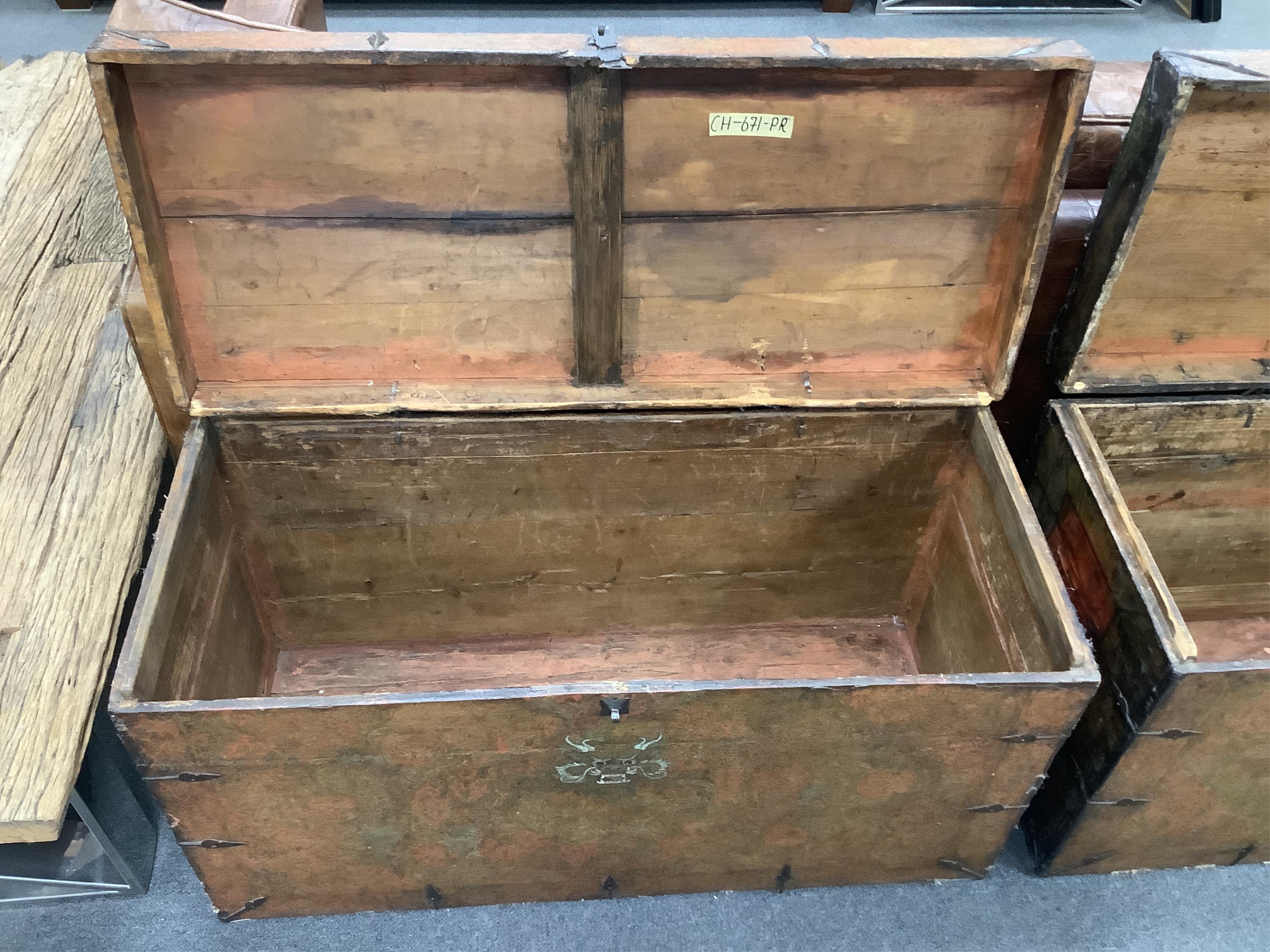 A pair of early 19th century Tibetan trunks, width 100cm, depth 42cm, height 57cm. Condition - poor